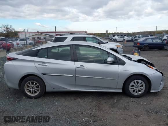 2017 Toyota Prius Two z VIN JTDKBRFU5H3550919, wystawiony jako IAAI lot #43525414 z przebiegiem 15 094 mil mil oraz . Historia ofert i sprzedaży dostępna na DreamBid. Obrazek 13.