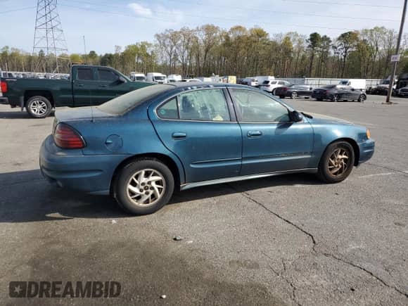 2003 Pontiac Grand Am SE1 с VIN 1G2NF52EX3C232087, выставлен на аукционе Copart как лот 54309545 с пробегом 187 075 миль миль и Списание • Salvage title. История ставок и продаж доступна на DreamBid. Изображение 3.