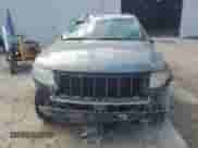 2011 Jeep Grand Cherokee Laredo with VIN 1J4RS4GG7BC580175, listed as a Copart auction lot 71319395 with 228,987 mi miles and Salvage title. Bid and sale history available at DreamBid. Image 5.