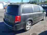 2012 Dodge Grand Caravan Crew z VIN 2C4RDGDG1CR123361, wystawiony jako IAAI lot #43418401 z przebiegiem 169 040 mil mil oraz . Historia ofert i sprzedaży dostępna na DreamBid. Obrazek 4.