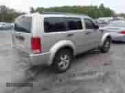 2009 Dodge Nitro SE z VIN 1D8GU28K39W505966, wystawiony jako IAAI lot #43430398 z przebiegiem 222 842 mil mil oraz . Historia ofert i sprzedaży dostępna na DreamBid. Obrazek 4.