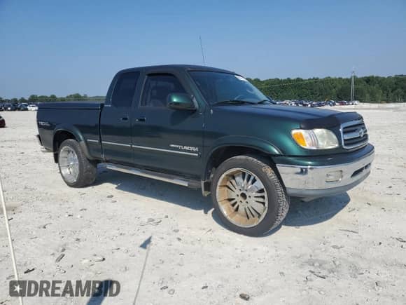 2001 Toyota Tundra Limited z VIN 5TBBT48101S211890, wystawiony jako Copart lot #69516035 z przebiegiem 97 003 mil mil oraz Czysty tytuł • Clean title. Historia ofert i sprzedaży dostępna na DreamBid. Obrazek 4.