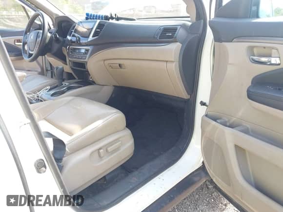 2017 Honda Pilot EX-L with VIN 5FNYF6H75HB081239, listed as a IAAI auction lot 42562518 with Not provided miles and . Bid and sale history available at DreamBid. Image 5.