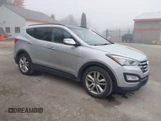 2014 Hyundai Santa Fe with VIN 5XYZWDLA6EG220309, listed as a IAAI auction lot 40650818 with 103,568 mi miles and . Bid and sale history available at DreamBid. Image 1.