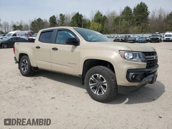2021 Chevrolet Colorado 4WD Z71 with VIN 1GCGTDEN1M1258691, listed as a Copart auction lot 51511715 with 56,276 mi miles and Salvage title. Bid and sale history available at DreamBid. Image 4.