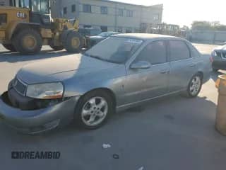 2003 Saturn LS with VIN 1G8JU54F33Y527678, listed as a Copart auction lot 82564405 with 114,235 mi miles and Salvage title. Bid and sale history available at DreamBid. Image 1.