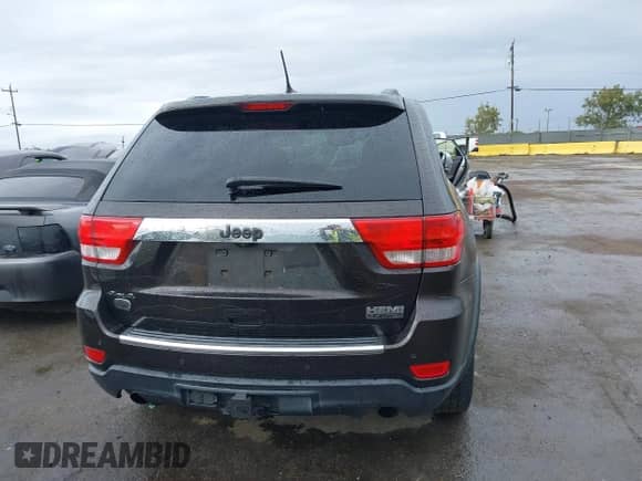 2012 Jeep Grand Cherokee Overland z VIN 1C4RJFCT2CC287745, wystawiony jako IAAI lot #43439013 z przebiegiem 153 452 mil mil oraz . Historia ofert i sprzedaży dostępna na DreamBid. Obrazek 16.