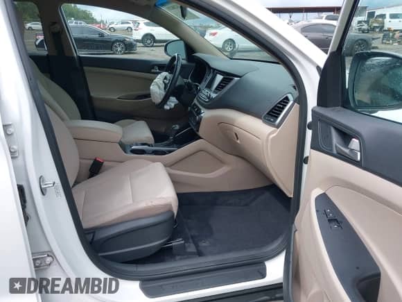 2018 Hyundai Tucson Sport with VIN KM8J33AL9JU801778, listed as a IAAI auction lot 43288201 with 147,031 mi miles and . Bid and sale history available at DreamBid. Image 5.