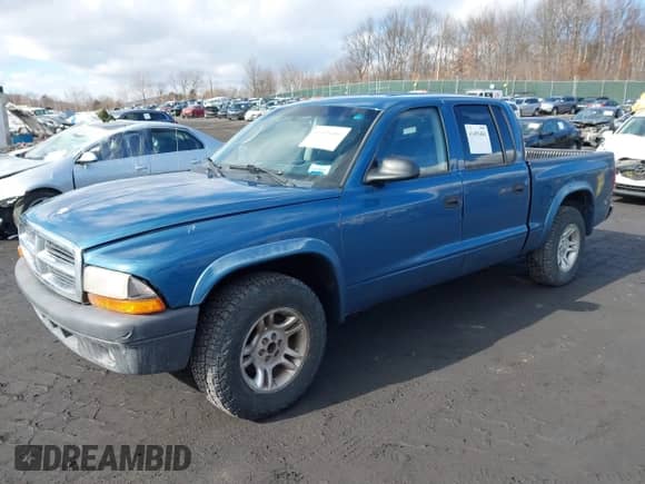 2004 Dodge Dakota Sport с VIN 1D7HL38K84S573410, выставлен на аукционе IAAI как лот 41495481 с пробегом 218 866 миль миль и . История ставок и продаж доступна на DreamBid. Изображение 2.