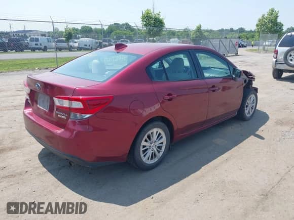 2017 Subaru Impreza Premium with VIN 4S3GKAD65H3629082, listed as a IAAI auction lot 42427417 with 65,609 mi miles and . Bid and sale history available at DreamBid. Image 4.