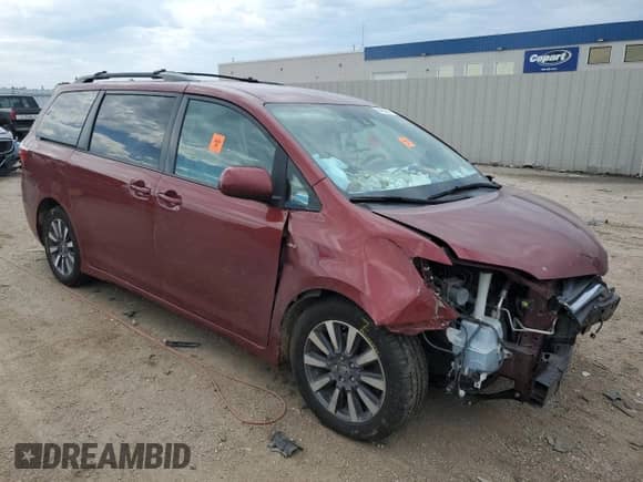 2018 Toyota Sienna LE with VIN 5TDJZ3DC7JS200498, listed as a Copart auction lot 80458855 with 105,783 mi miles and Salvage title. Bid and sale history available at DreamBid. Image 4.