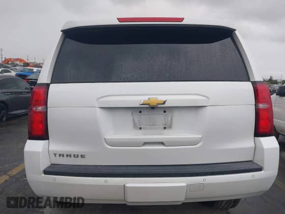 2018 Chevrolet Tahoe LT z VIN 1GNSKBKC7JR351112, wystawiony jako IAAI lot #41732631 z przebiegiem 103 771 mil mil oraz . Historia ofert i sprzedaży dostępna na DreamBid. Obrazek 16.