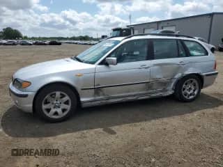 2003 BMW 3 Series 325i with VIN WBAEN334X3EZ15448, listed as a Copart auction lot 65278205 with 135,503 mi miles and Salvage title. Bid and sale history available at DreamBid. Image 1.