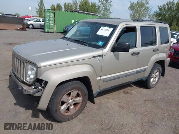 2011 Jeep Liberty Sport with VIN 1J4PN2GK4BW593858, listed as a IAAI auction lot 43331397 with 130,728 mi miles and . Bid and sale history available at DreamBid. Image 2.