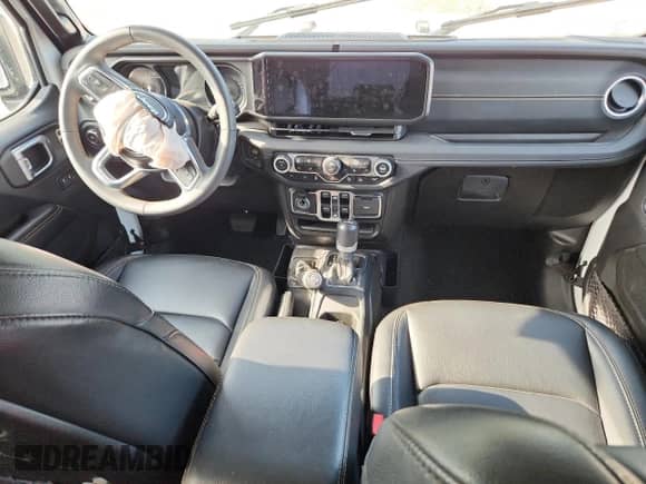 2024 Jeep Wrangler Sahara with VIN 1C4RJXP63RW215504, listed as a Copart auction lot 60795235 with 13,631 mi miles and Salvage title. Bid and sale history available at DreamBid. Image 8.