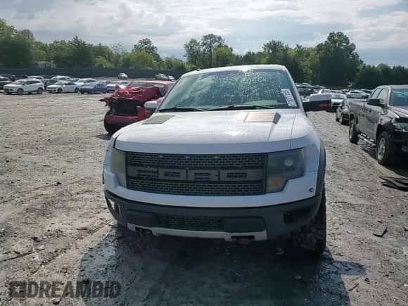 2014 Ford F-150 SVT Raptor with VIN 1FTFW1R6XEFC26198, listed as a Copart auction lot 71077155 with 142,160 mi miles and Salvage title. Bid and sale history available at DreamBid. Image 13.
