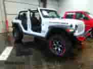 2021 Jeep Wrangler Unlimited Rubicon with VIN 1C4HJXFN9MW779882, listed as a IAAI auction lot 37264183 with 36,314 mi miles and . Bid and sale history available at DreamBid. Image 1.