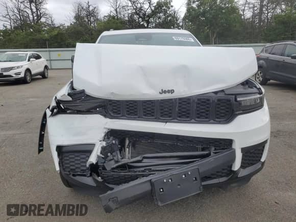 2024 Jeep Grand Cherokee Altitude X with VIN 1C4RJKAGXR8584093, listed as a Copart auction lot 69179305 with 8,704 mi miles and Salvage title. Bid and sale history available at DreamBid. Image 5.