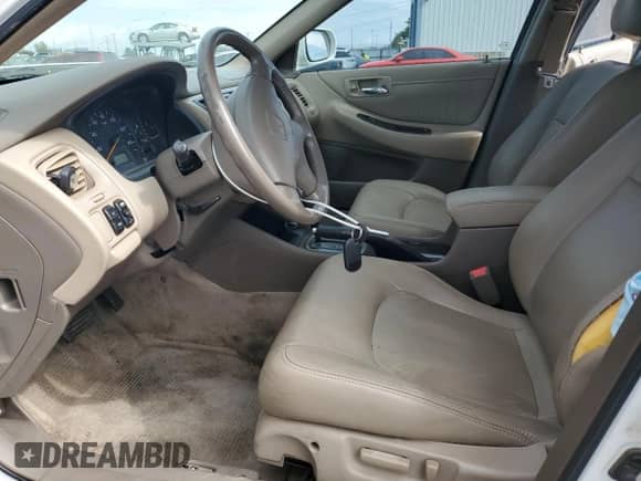 2002 Honda Accord EX with VIN 1HGCG165X2A077376, listed as a Copart auction lot 80703385 with 106,051 mi miles and Salvage title. Bid and sale history available at DreamBid. Image 7.