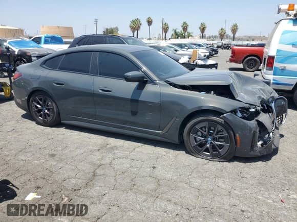 2023 BMW i4 eDrive35 with VIN WBY43AW0XPFR19726, listed as a Copart auction lot 64955865 with 16,952 mi miles and Salvage title. Bid and sale history available at DreamBid. Image 4.