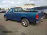 2001 Ford F-150 XL with VIN 1FTRF17W71NA44992, listed as a Copart auction lot 81205035 with 125,671 mi miles and Salvage title. Bid and sale history available at DreamBid. Image 2.