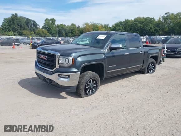 2018 GMC Sierra 1500 SLT z VIN 3GTU2NEC1JG470434, wystawiony jako IAAI lot #43335361 z przebiegiem 79 283 mil mil oraz . Historia ofert i sprzedaży dostępna na DreamBid. Obrazek 2.
