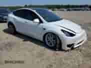 2023 Tesla Model Y Long Range with VIN 7SAYGAEEXPF895200, listed as a Copart auction lot 80203825 with Not provided miles and Salvage title. Bid and sale history available at DreamBid. Image 4.