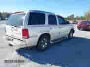 2004 Cadillac Escalade with VIN 1GYEC63TX4R299594, listed as a IAAI auction lot 41833184 with 320,822 mi miles and . Bid and sale history available at DreamBid. Image 4.