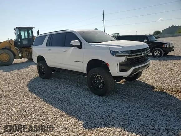 2021 Chevrolet Suburban Z71 with VIN 1GNSKDKD3MR441110, listed as a Copart auction lot 70474075 with 70,456 mi miles and Salvage title. Bid and sale history available at DreamBid. Image 14.