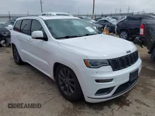 2018 Jeep Grand Cherokee Overland with VIN 1C4RJFCT0JC250223, listed as a IAAI auction lot 42265000 with 132,931 mi miles and . Bid and sale history available at DreamBid. Image 1.