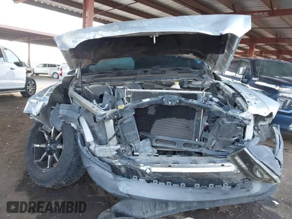 2015 Ram 1500 ST with VIN 1C6RR7FT1FS743911, listed as a IAAI auction lot 41710430 with 166,356 mi miles and . Bid and sale history available at DreamBid. Image 6.