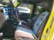 2023 Jeep Wrangler Willys with VIN 1C4HJXDN6PW681464, listed as a Copart auction lot 68998725 with 36,995 mi miles and Salvage title. Bid and sale history available at DreamBid. Image 7.