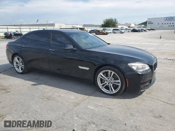 2013 BMW 7 Series 750Li with VIN WBAYE8C54DDE22023, listed as a Copart auction lot 66571615 with 95,235 mi miles and Clean title. Bid and sale history available at DreamBid. Image 4.