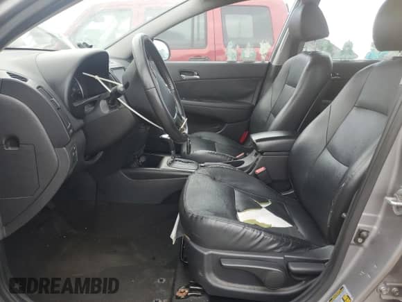 2012 Hyundai Elantra GLS z VIN KMHDC8AE3CU131465, wystawiony jako Copart lot #66105375 z przebiegiem 160 621 mil mil oraz Szkoda całkowita • Salvage title. Historia ofert i sprzedaży dostępna na DreamBid. Obrazek 7.