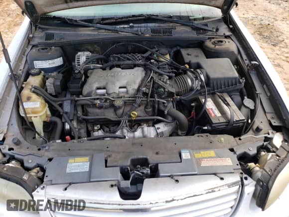 2000 Chevrolet Malibu LS z VIN 1G1NE52J5Y6350025, wystawiony jako Copart lot #73934584 z przebiegiem 103 781 mil mil oraz Szkoda całkowita • Salvage title. Historia ofert i sprzedaży dostępna na DreamBid. Obrazek 13.