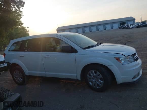 2015 Dodge Journey American Value with VIN 3C4PDCAB1FT587647, listed as a IAAI auction lot 42822060 with 168,503 mi miles and . Bid and sale history available at DreamBid. Image 14.