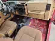 1998 Jeep Wrangler SE z VIN 1J4FY29P1WP766697, wystawiony jako Copart lot #81717285 z przebiegiem 203 156 mil mil oraz Szkoda całkowita • Salvage title. Historia ofert i sprzedaży dostępna na DreamBid. Obrazek 8.