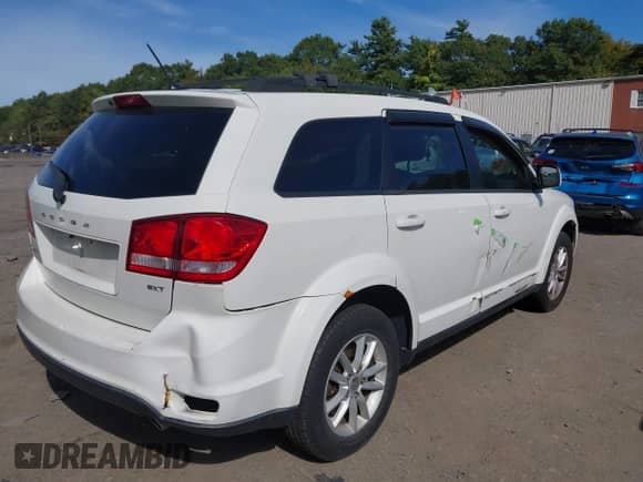 2013 Dodge Journey SXT with VIN 3C4PDDBGXDT547953, listed as a IAAI auction lot 43315889 with 148,494 mi miles and . Bid and sale history available at DreamBid. Image 6.