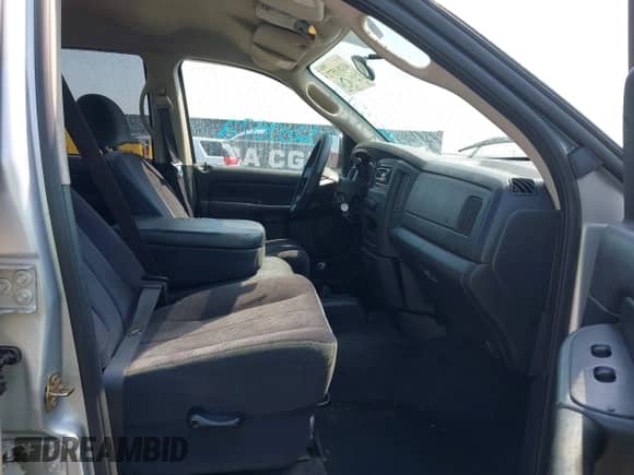 2005 Dodge 1500 SLT z VIN 1D7HU18D05J575646, wystawiony jako IAAI lot #43203572 z przebiegiem Nie podano mil oraz . Historia ofert i sprzedaży dostępna na DreamBid. Obrazek 5.