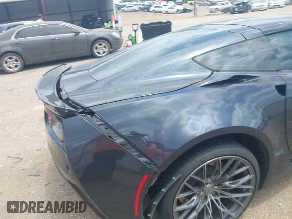 2015 Chevrolet Corvette Z06 3LZ with VIN 1G1YT2D6XF5601845, listed as a IAAI auction lot 42564055 with 99,989 mi miles and . Bid and sale history available at DreamBid. Image 21.