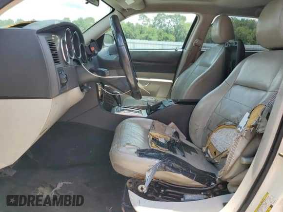 2005 Dodge Magnum RT with VIN 2D4GV58215H660833, listed as a Copart auction lot 66922285 with 173,384 mi miles and Salvage title. Bid and sale history available at DreamBid. Image 7.
