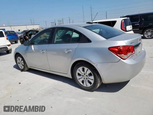 2015 Chevrolet Cruze LS z VIN 1G1PA5SH6F7155429, wystawiony jako Copart lot #65501925 z przebiegiem 139 301 mil mil oraz Czysty tytuł • Clean title. Historia ofert i sprzedaży dostępna na DreamBid. Obrazek 2.