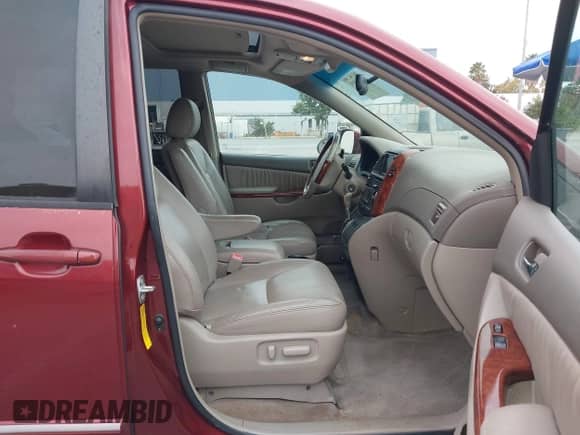 2005 Toyota Sienna XLE Limited z VIN 5TDZA22C15S281382, wystawiony jako IAAI lot #43300575 z przebiegiem 141 246 mil mil oraz . Historia ofert i sprzedaży dostępna na DreamBid. Obrazek 5.