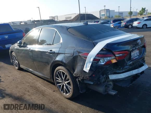 2021 Toyota Camry Hybrid XLE with VIN 4T1F31AK9MU547267, listed as a IAAI auction lot 42732726 with 106,937 mi miles and . Bid and sale history available at DreamBid. Image 15.