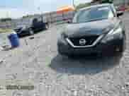 2016 Nissan Altima SR z VIN 1N4AL3AP4GC218501, wystawiony jako Copart lot #65929585 z przebiegiem 188 976 mil mil oraz Szkoda całkowita • Salvage title. Historia ofert i sprzedaży dostępna na DreamBid. Obrazek 13.