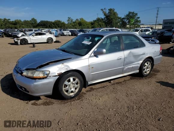 2002 Honda Accord EX with VIN 1HGCG56692A038763, listed as a Copart auction lot 71771595 with 158,801 mi miles and Salvage title. Bid and sale history available at DreamBid. Image 1.