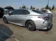 2023 Toyota Camry Hybrid SE with VIN 4T1G31AK6PU618210, listed as a Copart auction lot 64641305 with 21,685 mi miles and Salvage title. Bid and sale history available at DreamBid. Image 2.