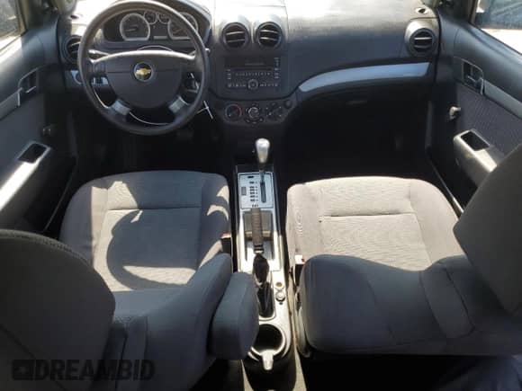 2009 Chevrolet Aveo LS z VIN KL1TD56E79B668243, wystawiony jako Copart lot #73984184 z przebiegiem 120 765 mil mil oraz Nie do naprawy • Non repairable. Historia ofert i sprzedaży dostępna na DreamBid. Obrazek 8.