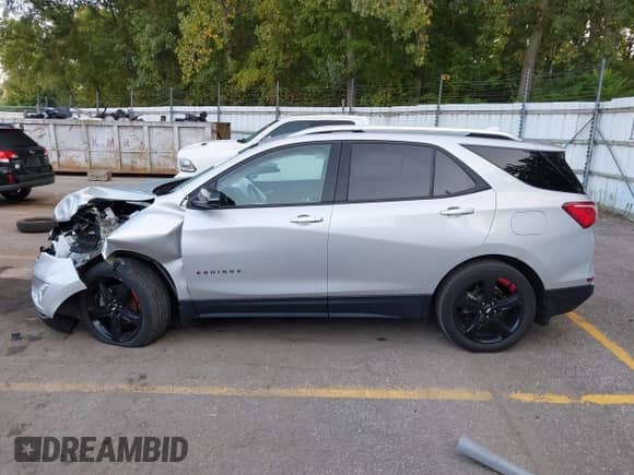 2021 Chevrolet Equinox Premier with VIN 2GNAXXEV8M6164551, listed as a IAAI auction lot 43130369 with 35,768 mi miles and . Bid and sale history available at DreamBid. Image 15.