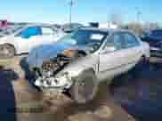 1998 Honda Accord LX z VIN 1HGCG1642WA070628, wystawiony jako IAAI lot #41457636 z przebiegiem 260 036 mil mil oraz . Historia ofert i sprzedaży dostępna na DreamBid. Obrazek 19.